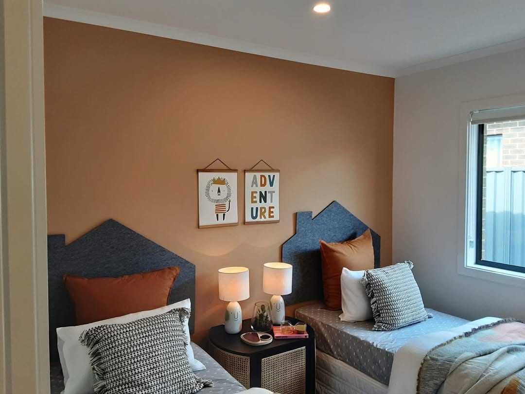 Children's bedroom painted in a fresh, light colour scheme