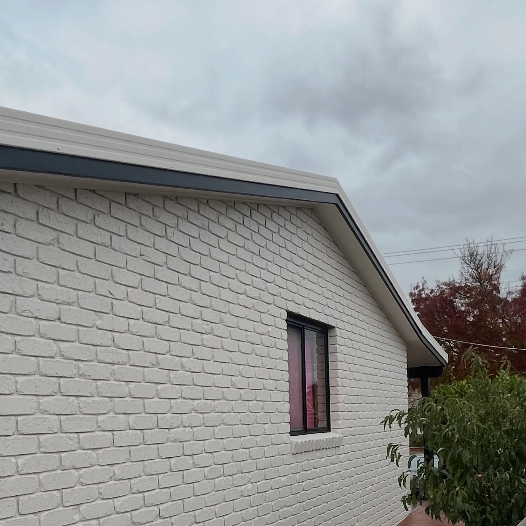 Brick home exterior after painting