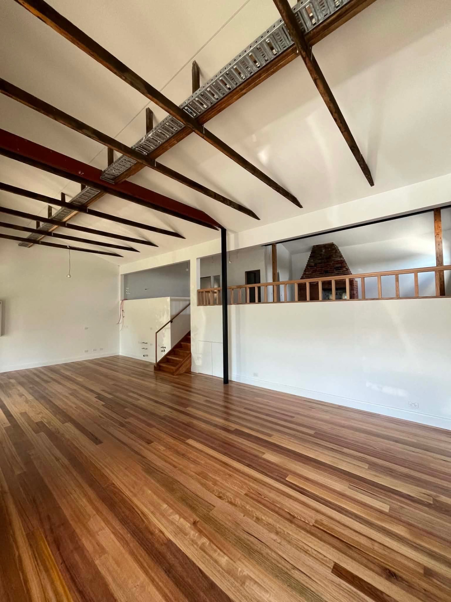 Open-plan living area repainted during a renovation
